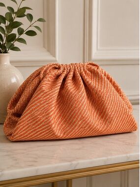Lulu's Vibrant Orange Clutch